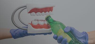 Refrigerantes podem ajudar a pagar os dentistas?